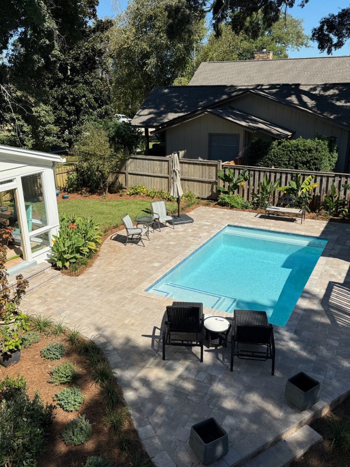 Courtyard pool from above with paver deck